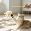 New three-color feather cat toy stick, cat toy, elastic rope interactive handle, durable cat toy pet products factory details Picture